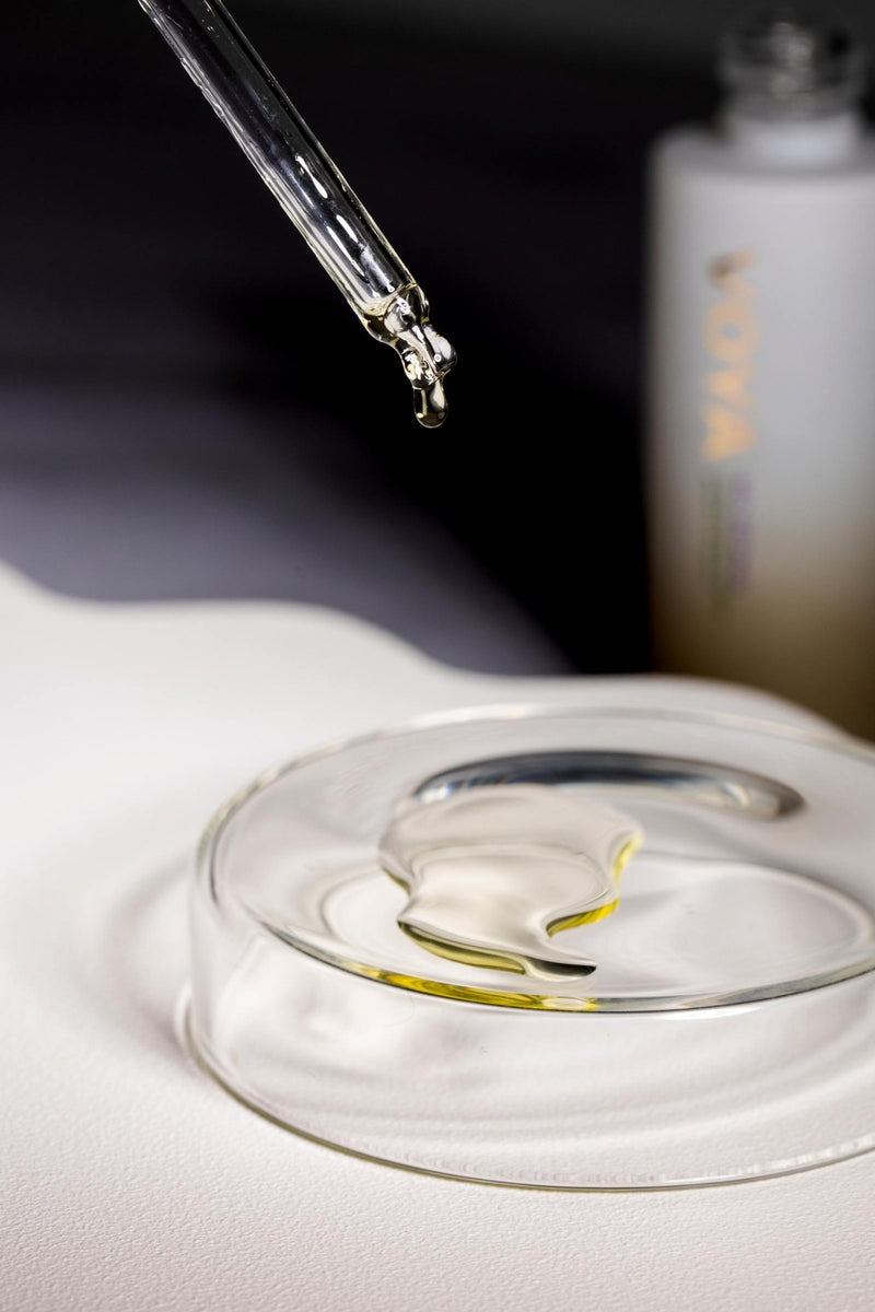 voya bio retinol serum oil being dropped from a pipette