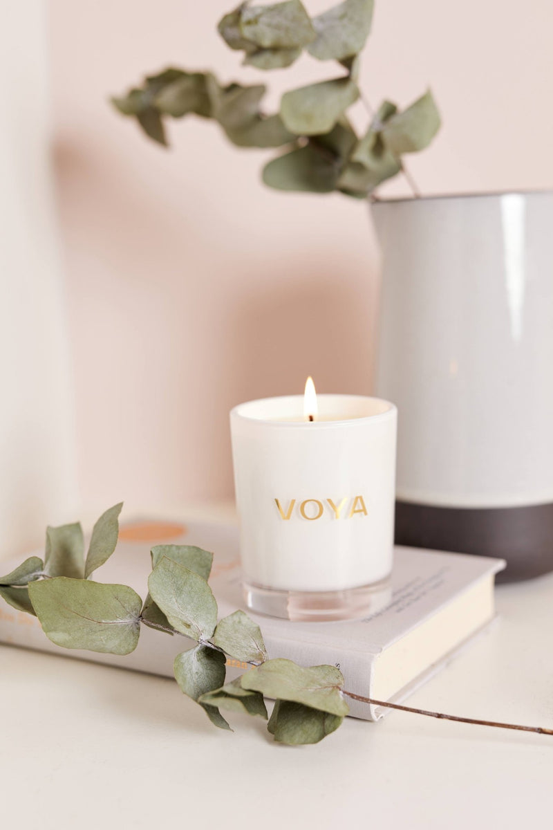 VOYA Skincare USA Eucalyptus, Rosemary, and Lime Luxury Essential Oil Candle, in home setting.
