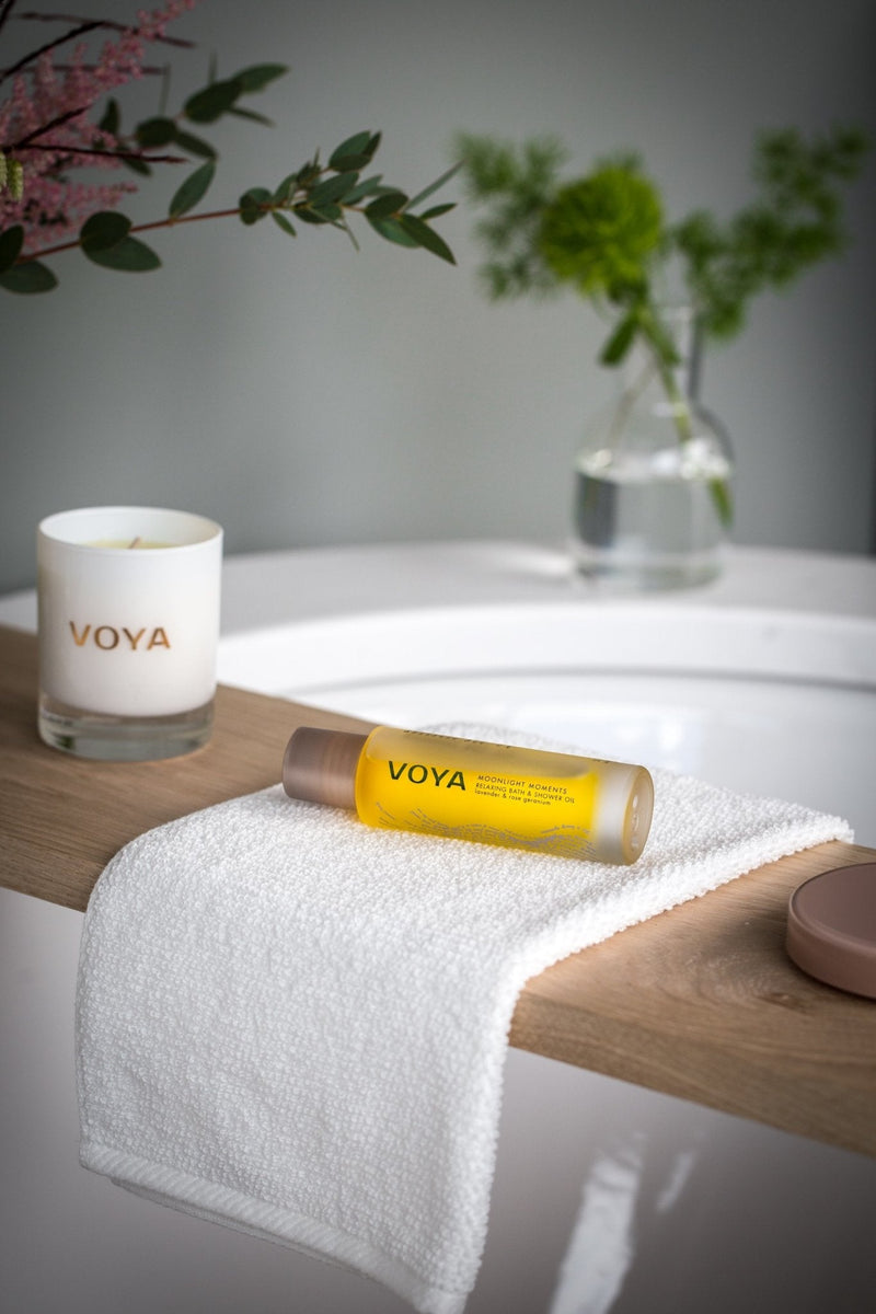 Moonlight Moments Relaxing Bath Oil on bath tray, VOYA Skincare USA